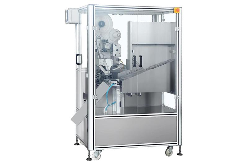 Machine d'étiquetage pour tube souple