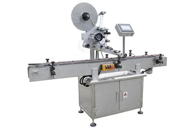 Applicateur d'étiquettes pour surface plane